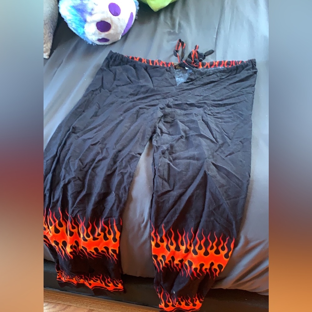 Size small, flare bottom, flame pants 🔥